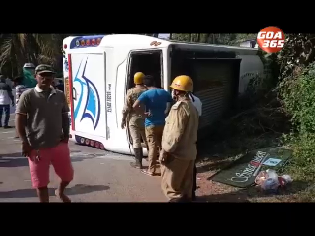Tourist carrying bus overturns at Bogmalo